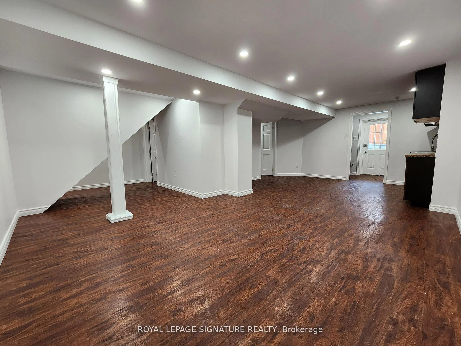 Photo 9 of Unit Bsmt, 148 Tamarac Trail, Aurora, Aurora Highlands — HOMEH
