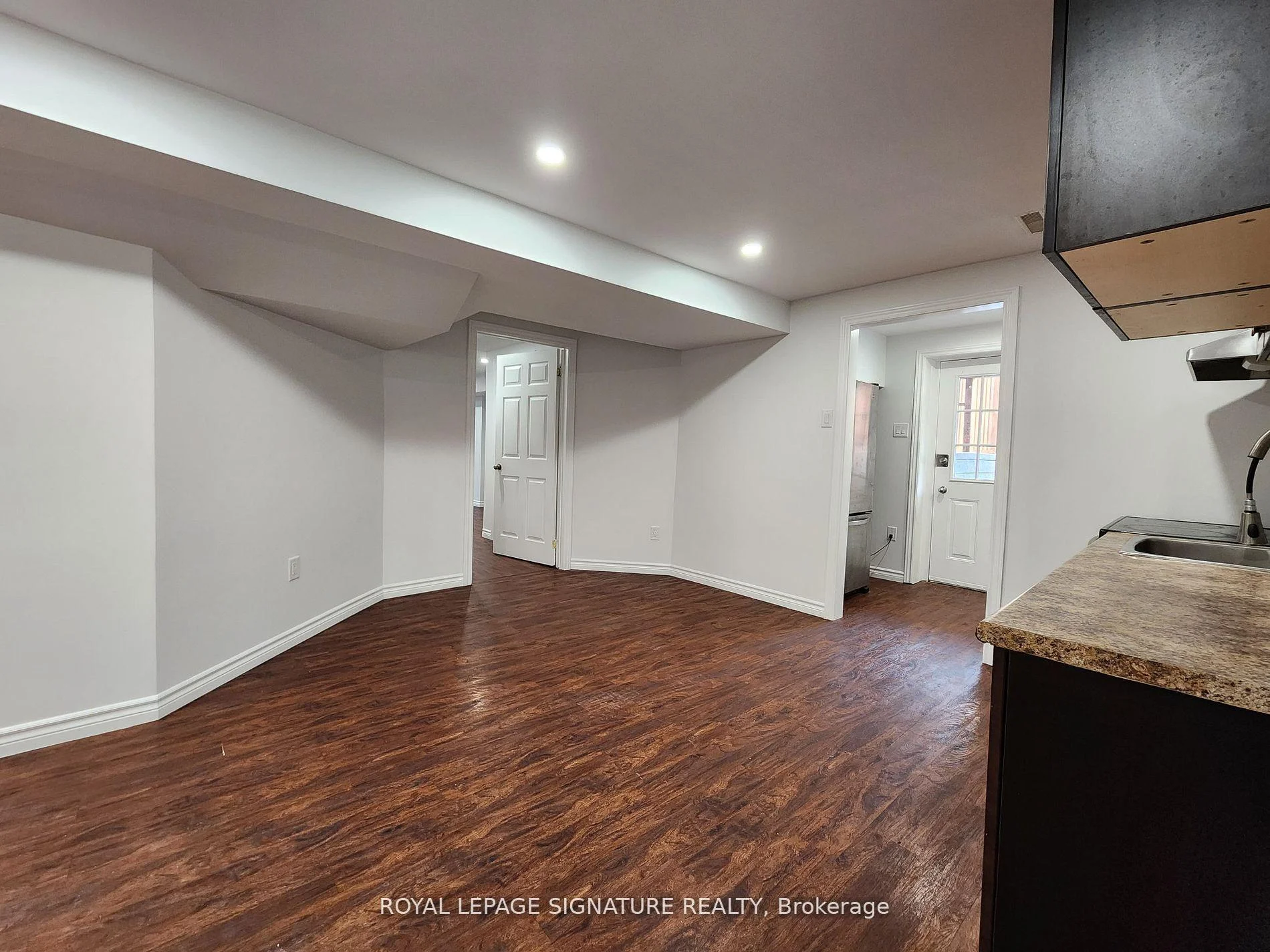 Photo 11 of Unit Bsmt, 148 Tamarac Trail, Aurora, Aurora Highlands — HOMEH