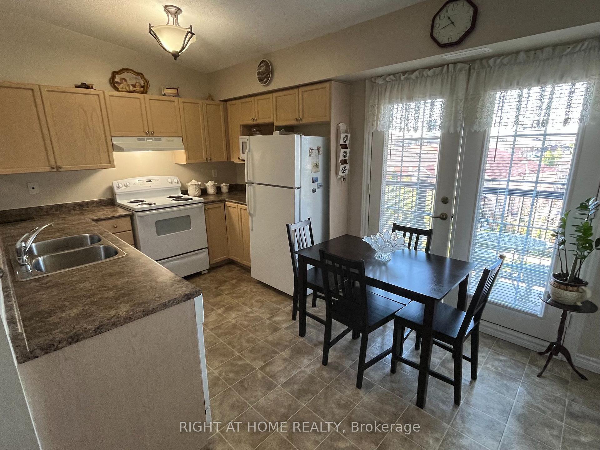 Photo 3 of Unit 401, 1487 Maple Avenue, Milton, Dempsey — HOMEH