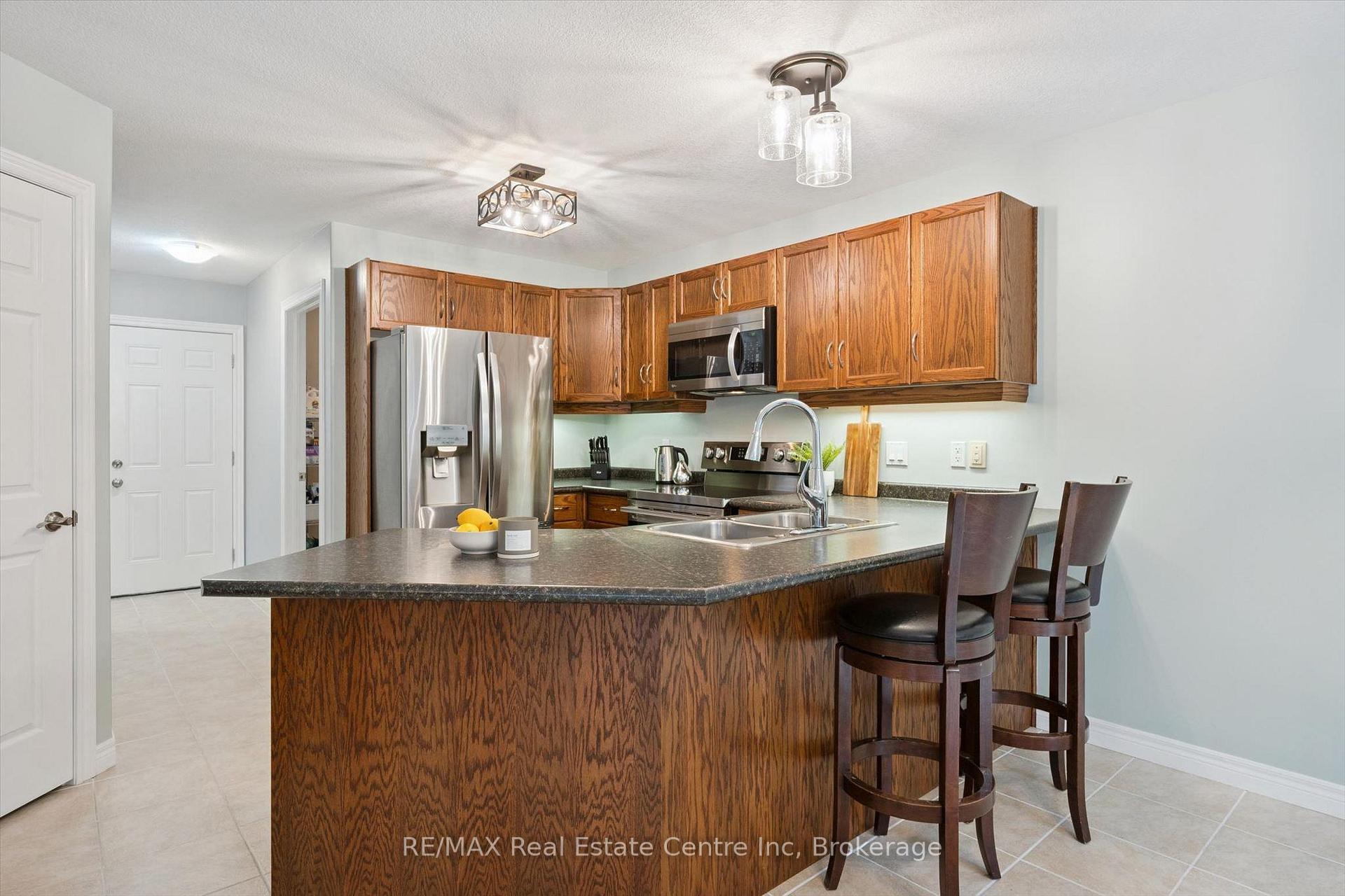 Photo 6 of 33 Washburn Drive, Guelph, Grange Road — HOMEH