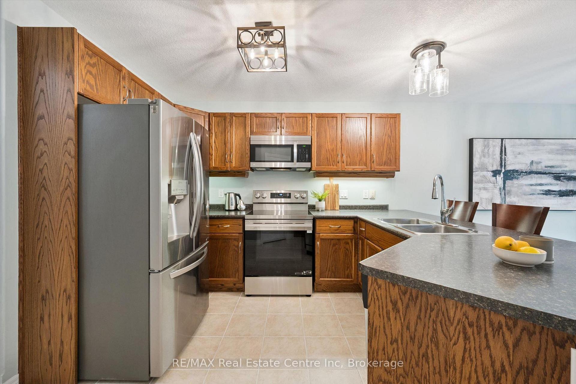 Photo 7 of 33 Washburn Drive, Guelph, Grange Road — HOMEH
