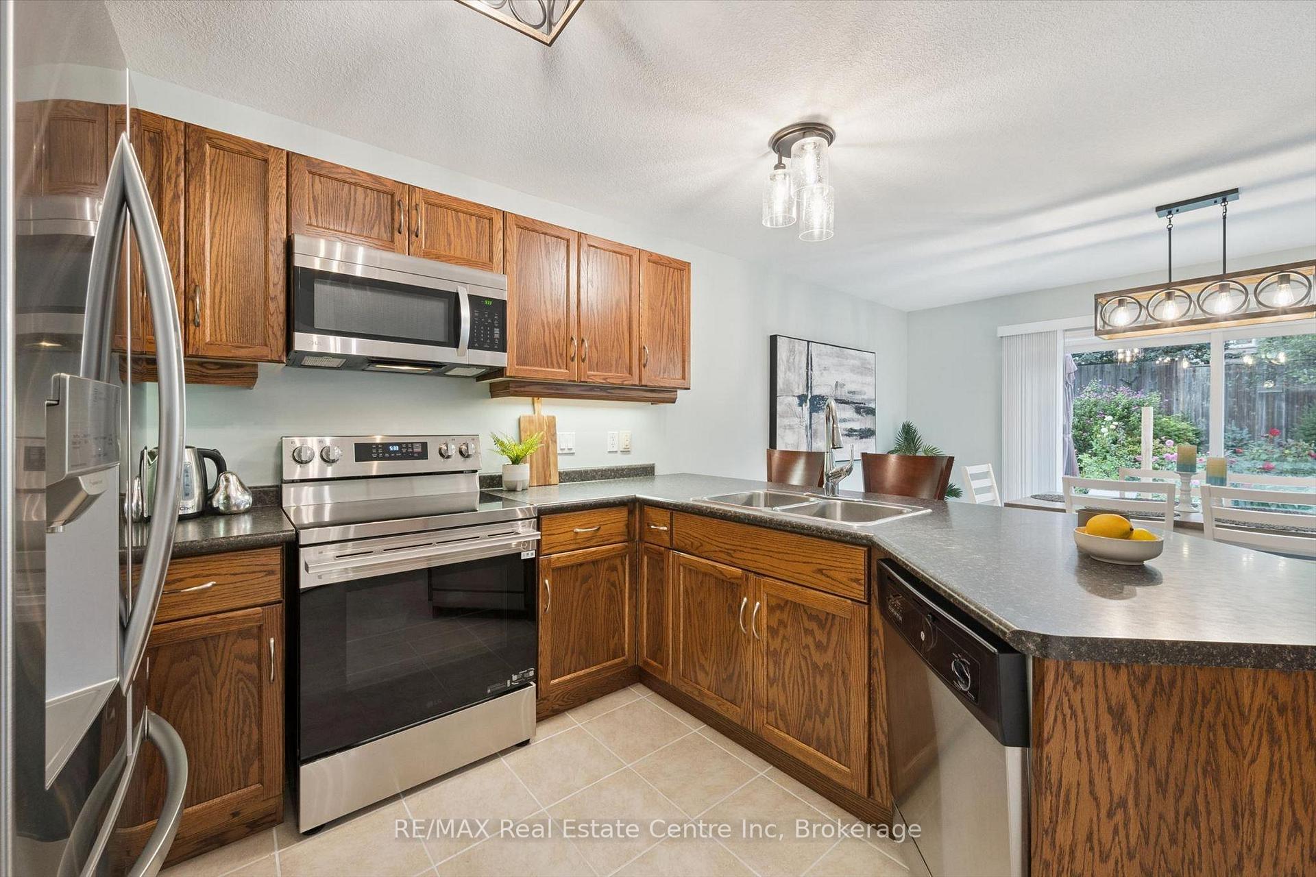 Photo 8 of 33 Washburn Drive, Guelph, Grange Road — HOMEH