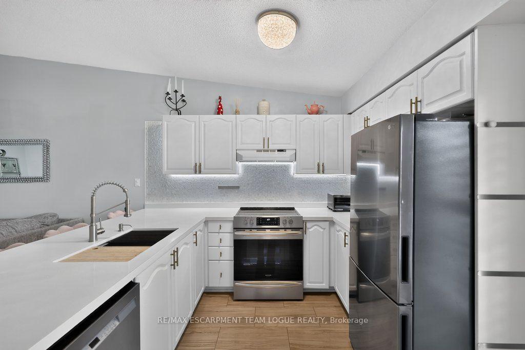 Photo 10 of Unit 412, 4003 Kilmer Drive, Burlington, Tansley — HOMEH