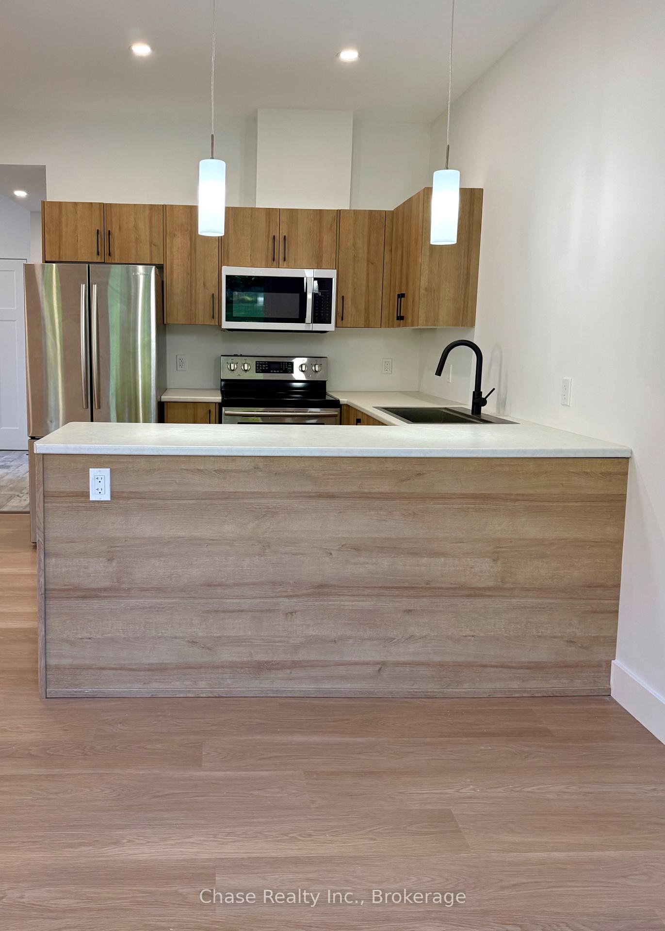 Photo 2 of Unit 2, 62 Gray Street, Severn, Coldwater — HOMEH