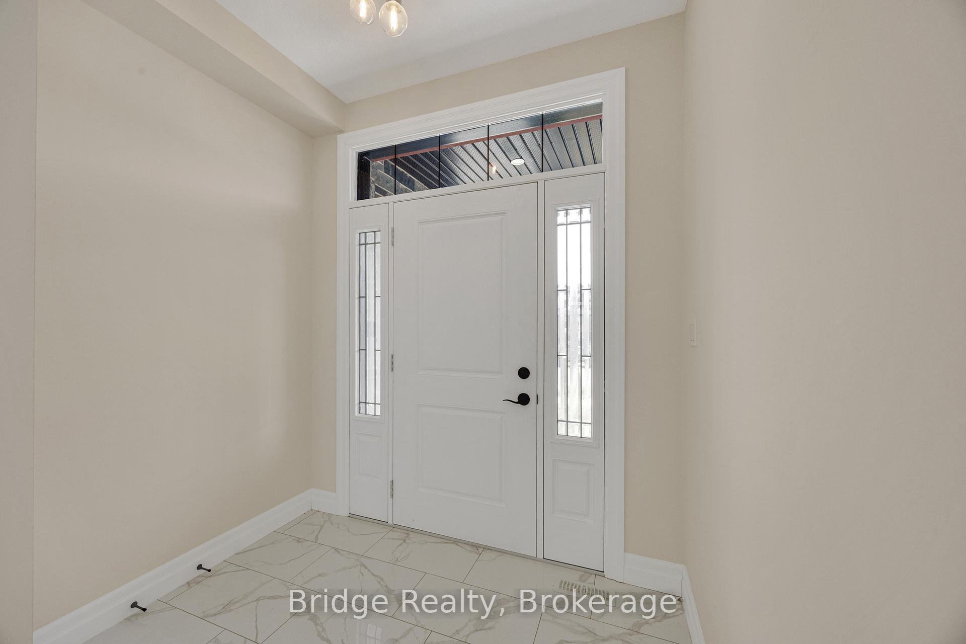 Photo 6 of 256 Tamarack Boulevard, Woodstock, Woodstock - North — HOMEH