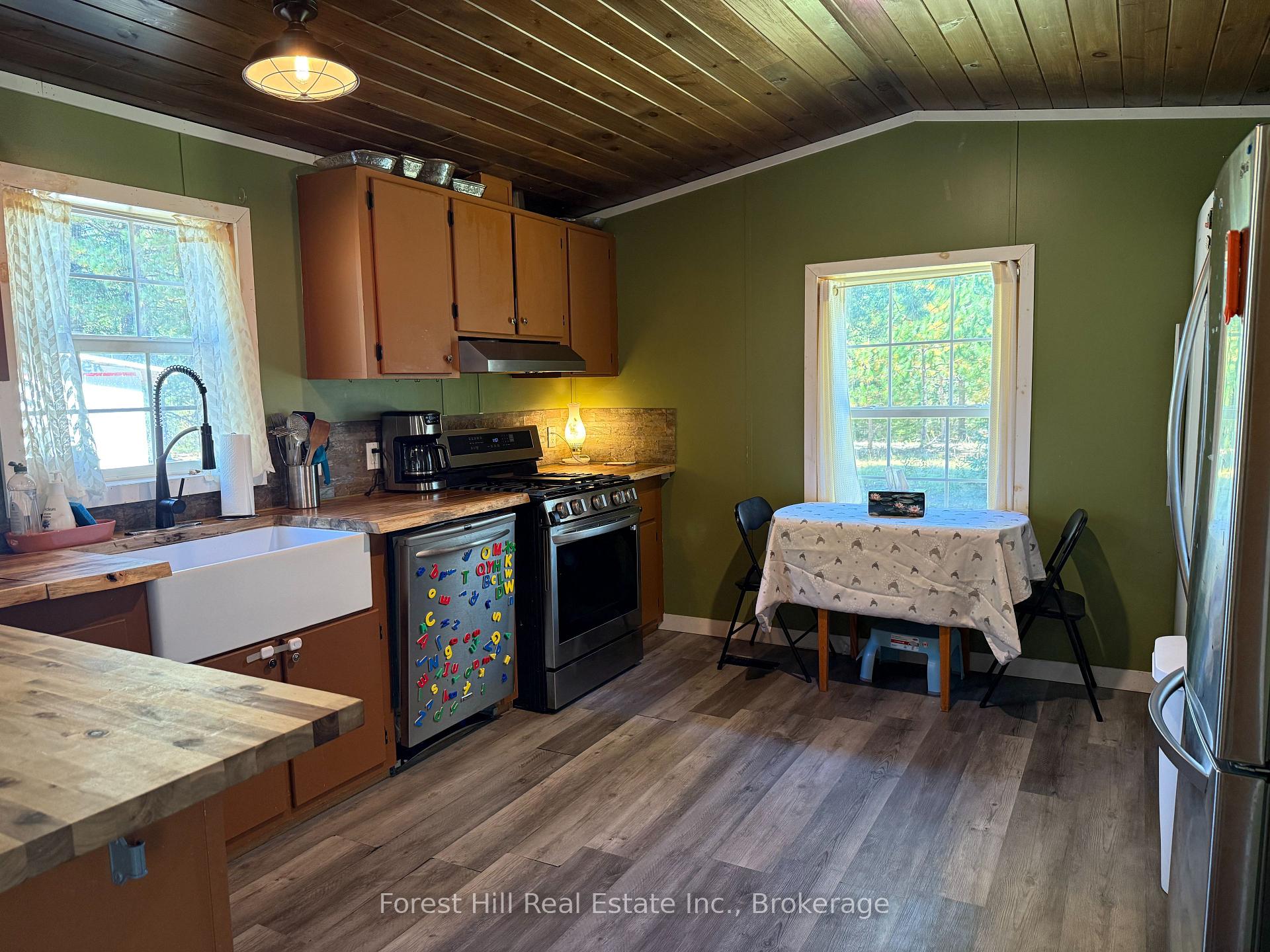 Photo 4 of 828 522 Highway, Powassan, Trout Creek — HOMEH