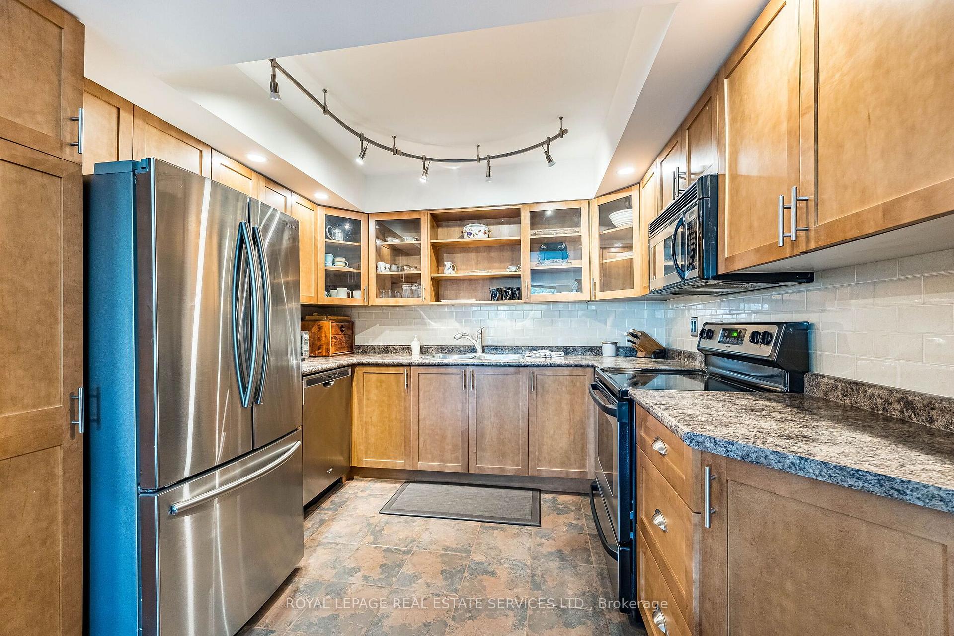 Photo 12 of Unit 402, 310 Mill Street S, Brampton, Brampton South — HOMEH