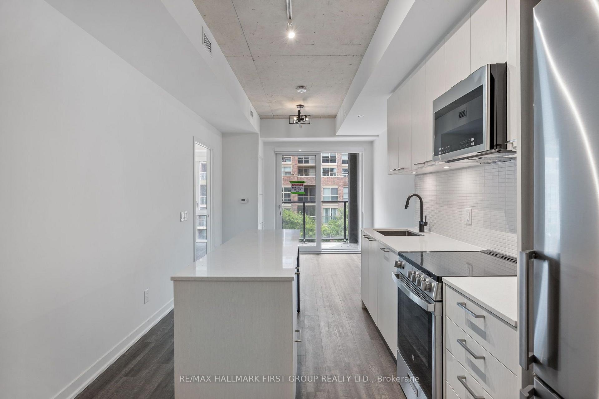 Photo 6 of Unit 408, 1808 St Clair Avenue W, Toronto, Weston-Pellam Park — HOMEH