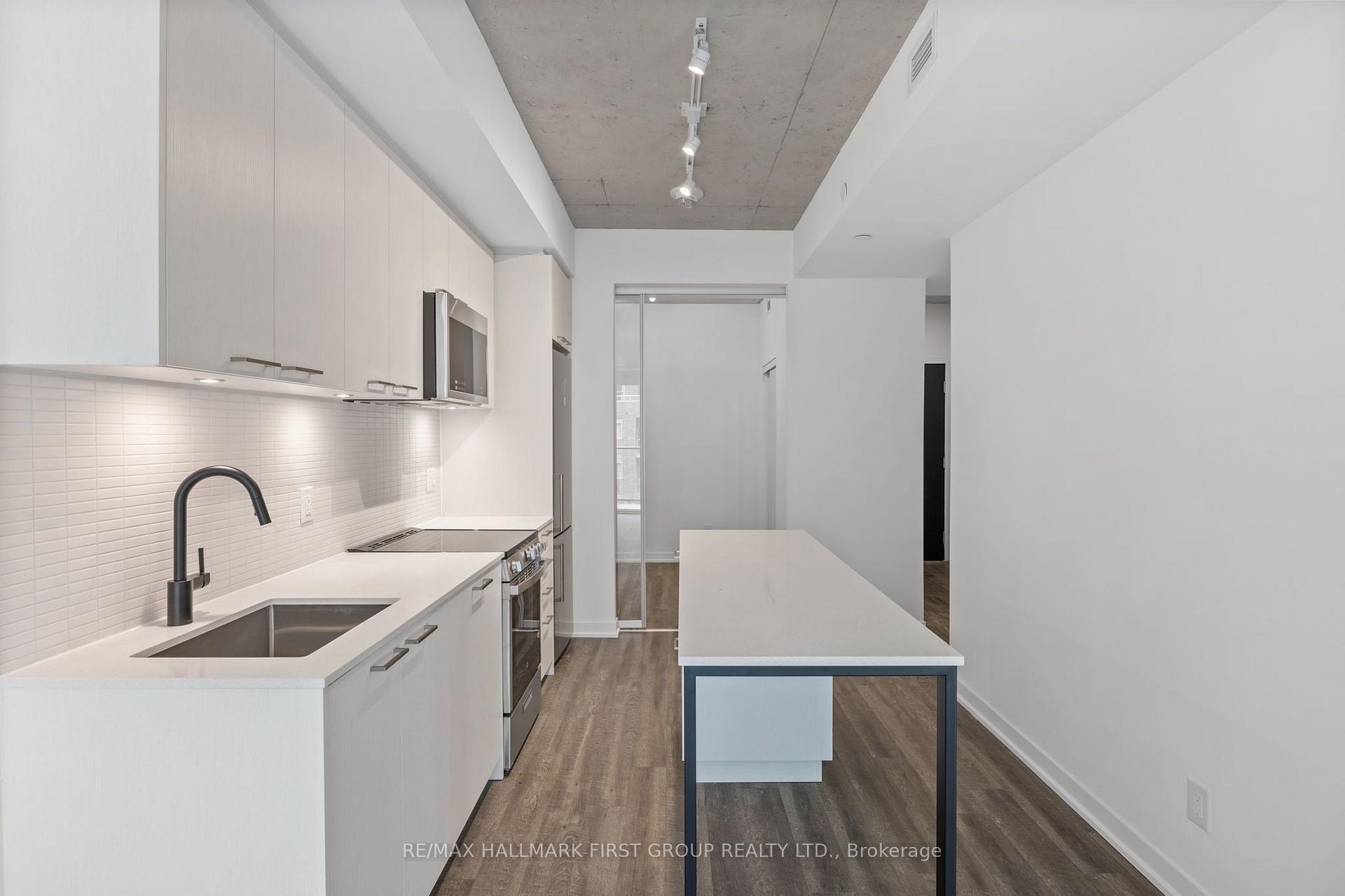 Photo 7 of Unit 408, 1808 St Clair Avenue W, Toronto, Weston-Pellam Park — HOMEH