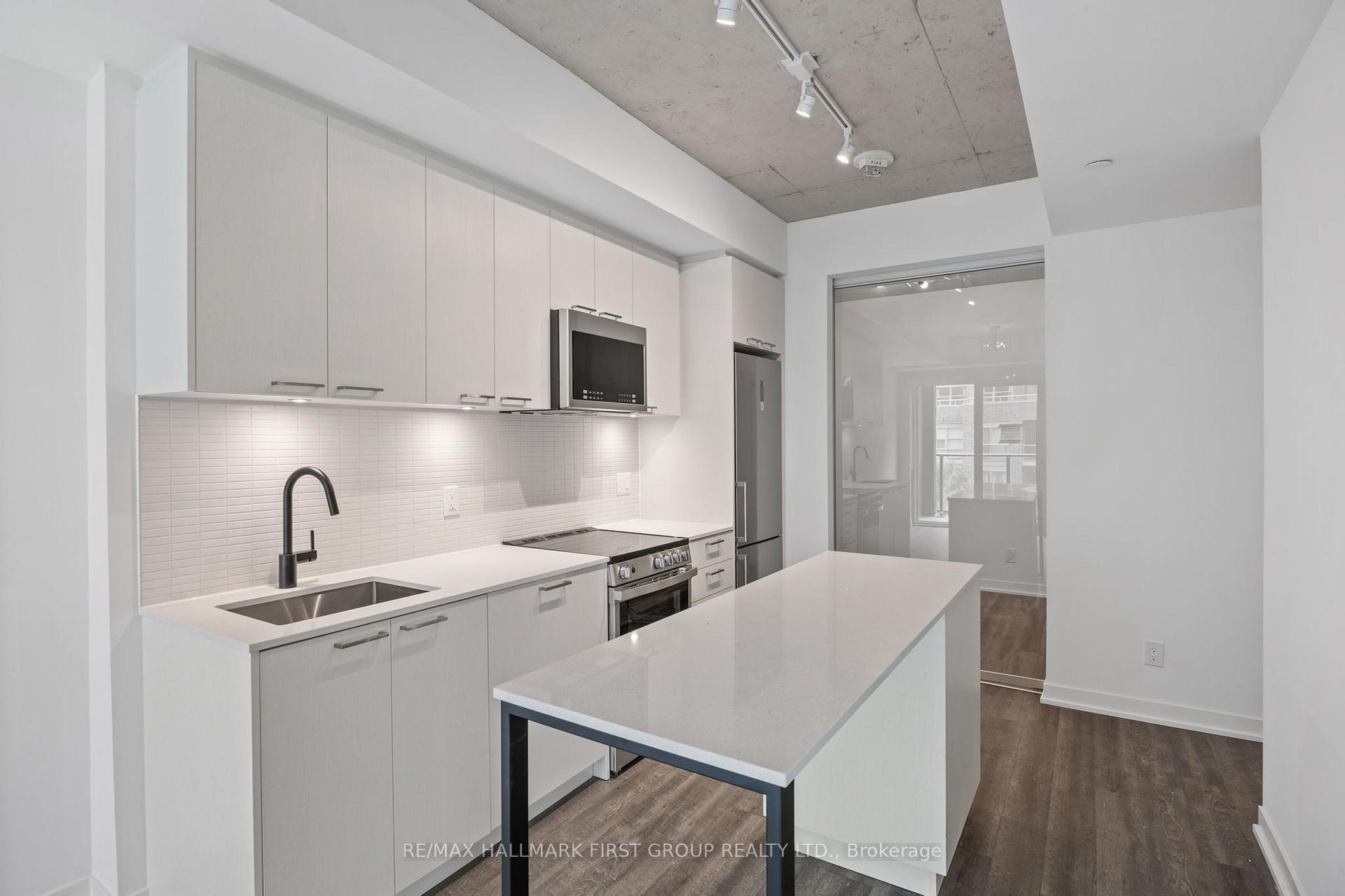 Photo 8 of Unit 408, 1808 St Clair Avenue W, Toronto, Weston-Pellam Park — HOMEH