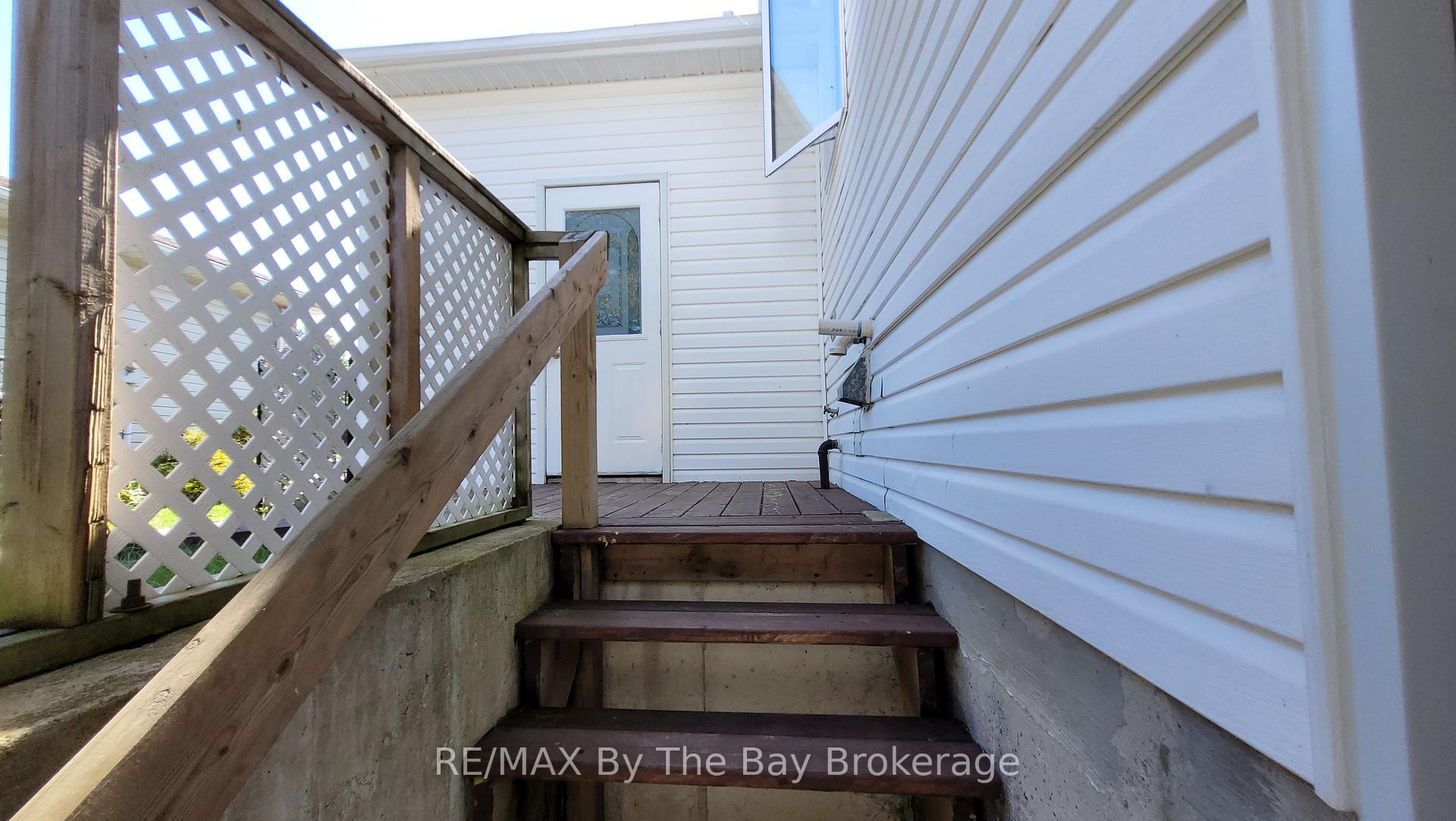 Photo 3 of Unit Basement, 48 Caribou Trail, Wasaga Beach — HOMEH