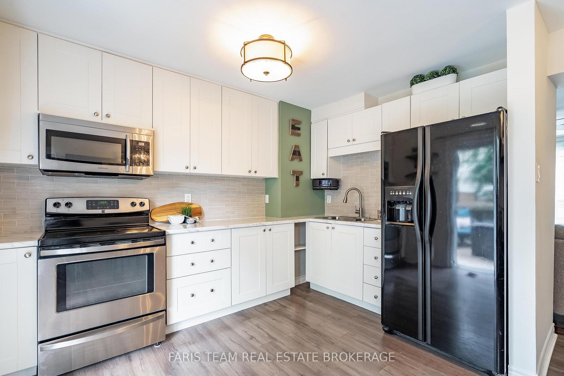 Photo 5 of Unit E4, 63 Ferris Lane, Barrie, Cundles East — HOMEH