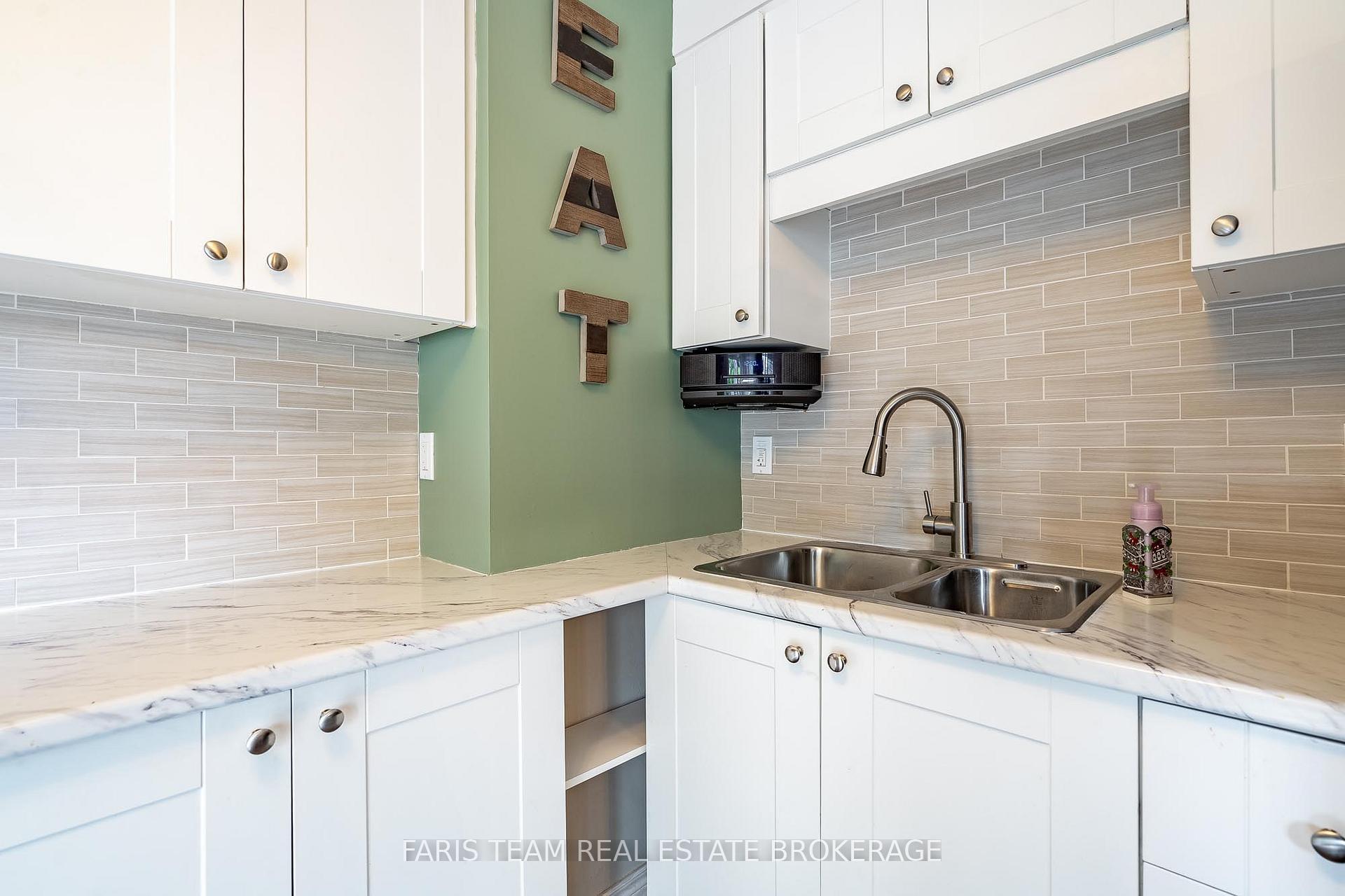 Photo 7 of Unit E4, 63 Ferris Lane, Barrie, Cundles East — HOMEH