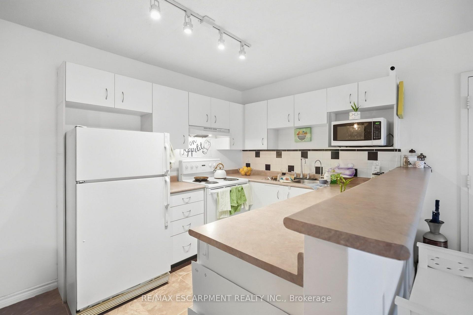 Photo 22 of Unit 310, 4025 Kilmer Drive, Burlington, Tansley — HOMEH