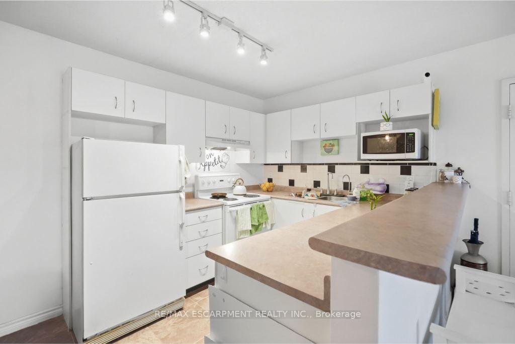 Photo 25 of Unit 310, 4025 Kilmer Drive, Burlington, Tansley — HOMEH
