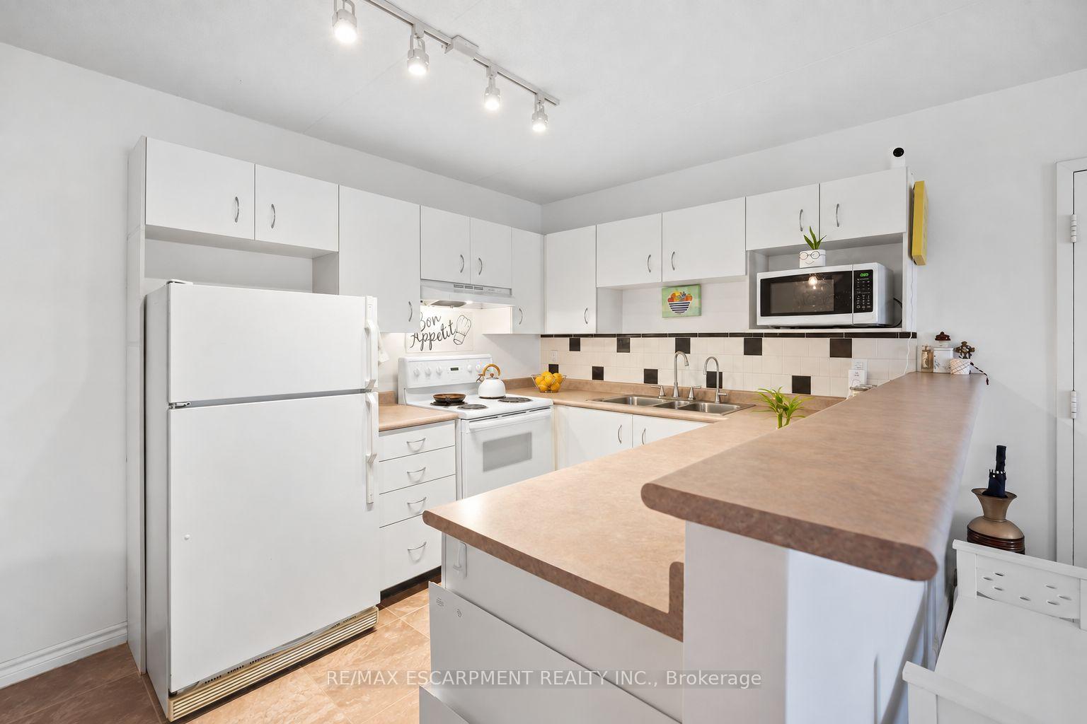 Photo 21 of Unit 310, 4025 Kilmer Drive, Burlington, Tansley — HOMEH