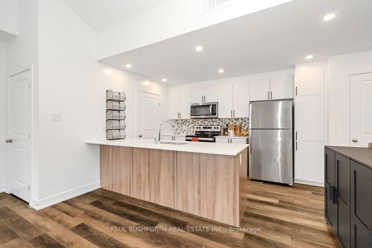 Photo 11 of Unit J, 310 Tulum Crescent, Ottawa, Kanata - Emerald Meadows/Trailwest — HOMEH