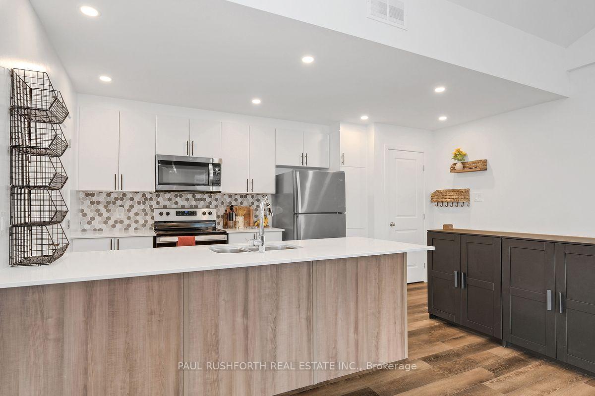 Photo 12 of Unit J, 310 Tulum Crescent, Ottawa, Kanata - Emerald Meadows/Trailwest — HOMEH