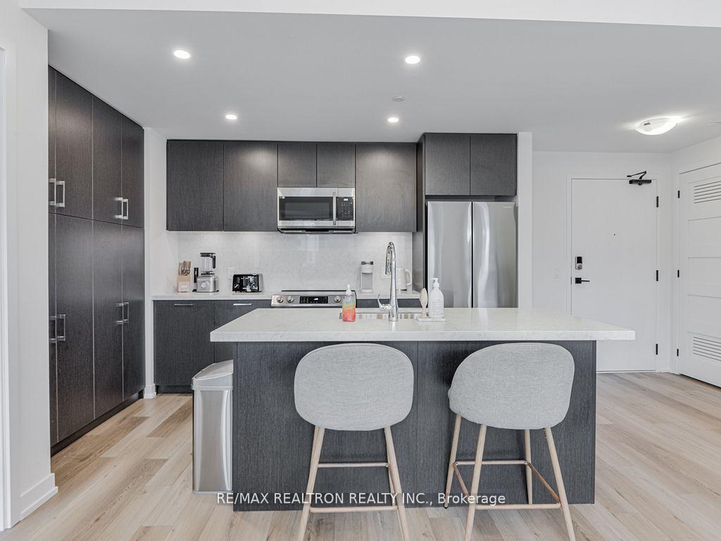 Photo 9 of Unit 310, 415 Sea Ray Avenue, Innisfil, Rural Innisfil — HOMEH