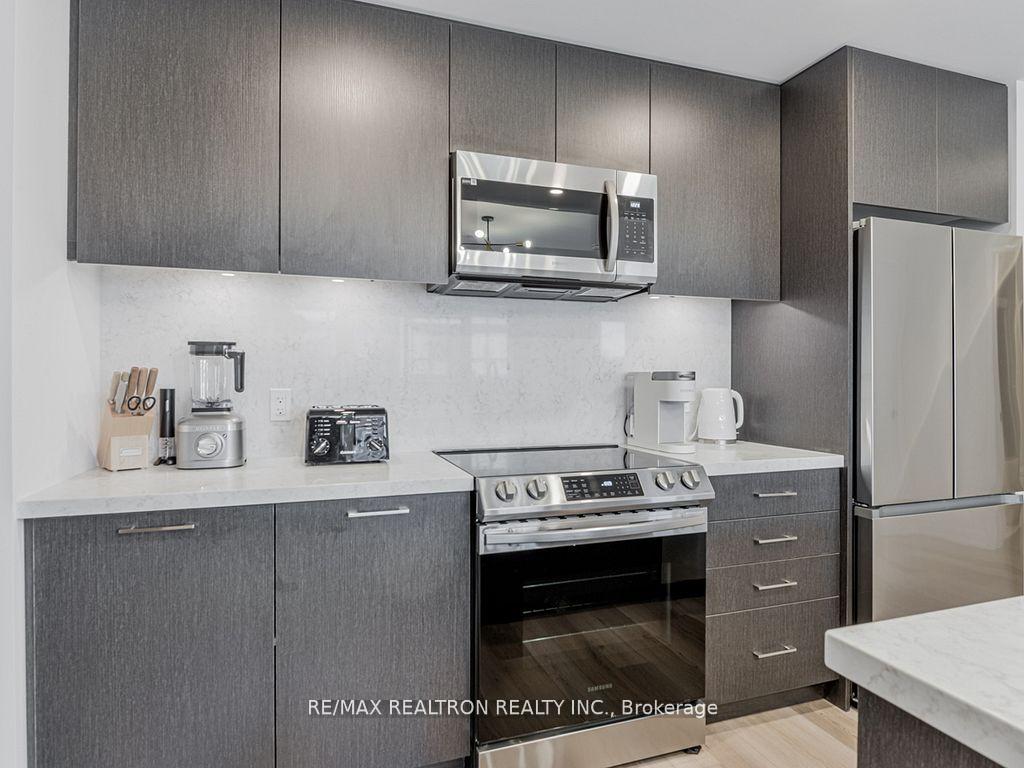 Photo 10 of Unit 310, 415 Sea Ray Avenue, Innisfil, Rural Innisfil — HOMEH