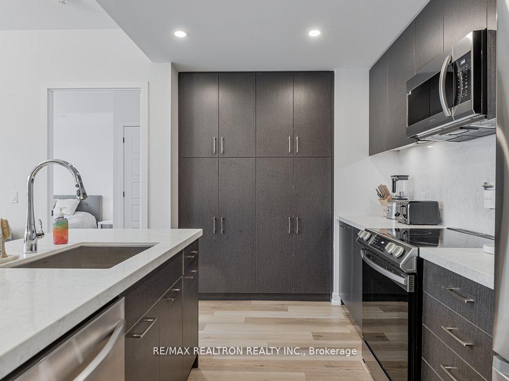 Photo 12 of Unit 310, 415 Sea Ray Avenue, Innisfil, Rural Innisfil — HOMEH