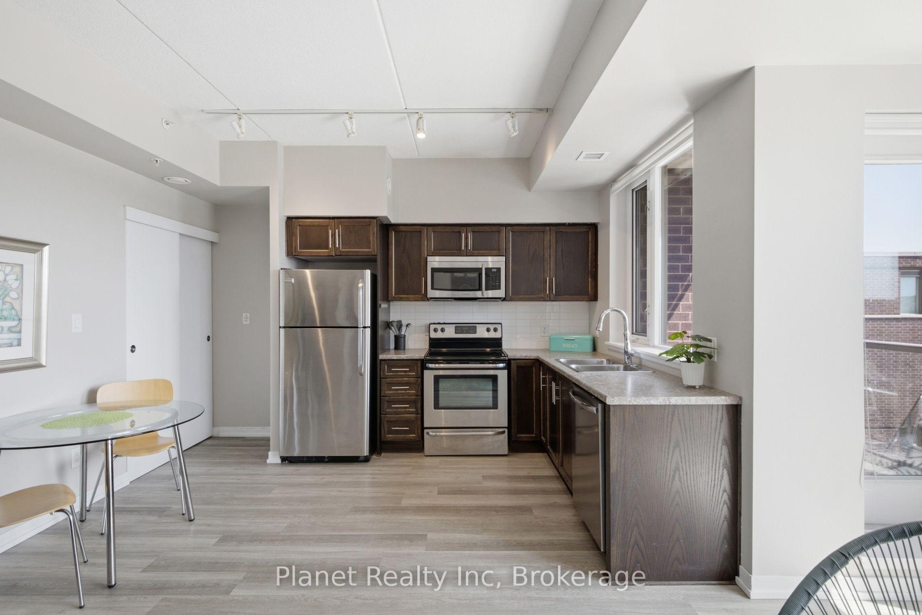 Photo 6 of Unit 406, 5 Gordon Street, Guelph, Downtown — HOMEH