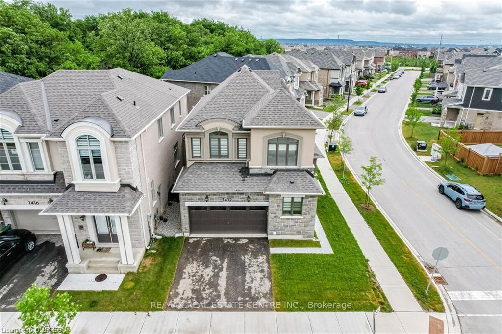 Photo 2 of Unit Bsmt., 1412 Rose Way, Milton, Cobban — HOMEH