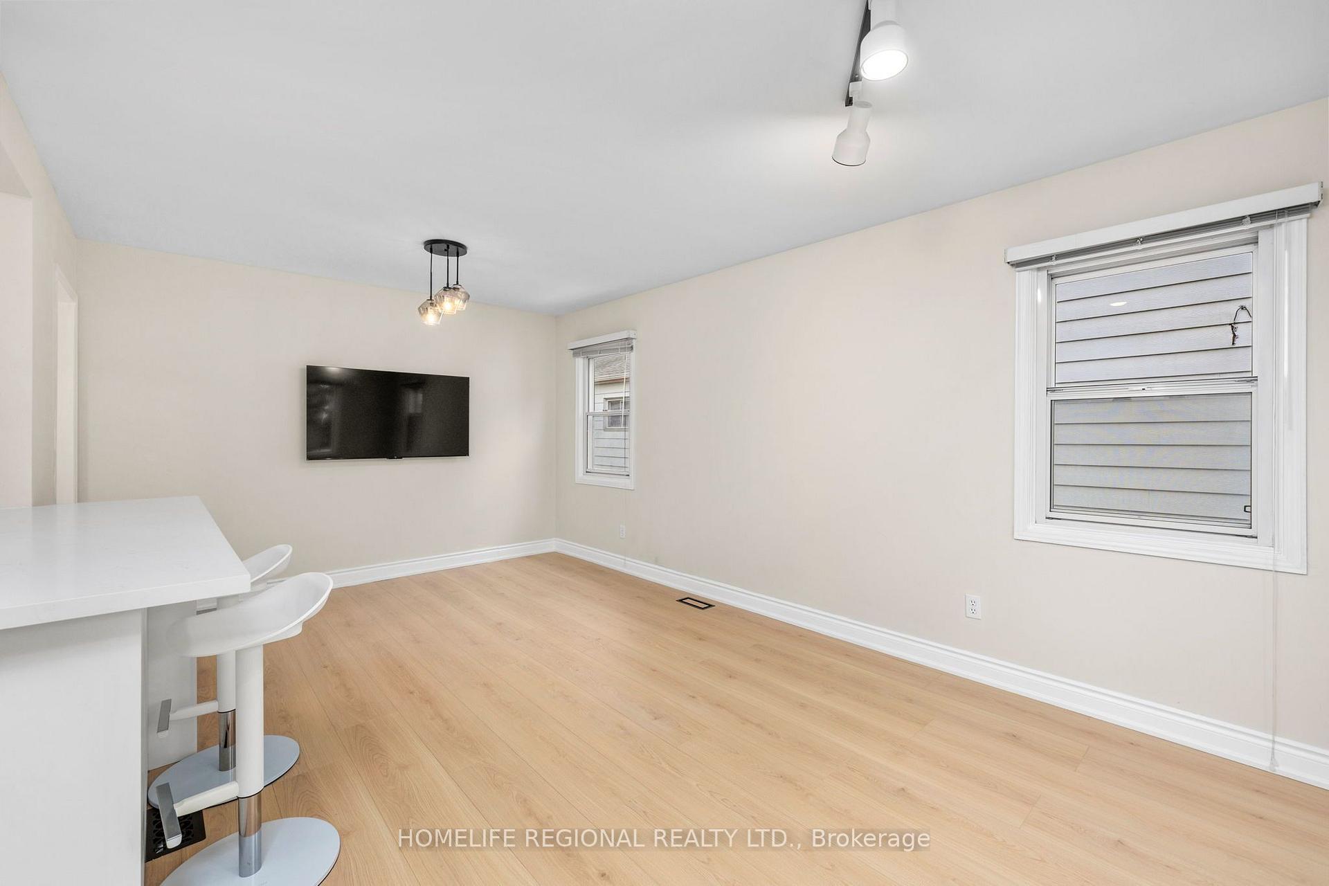 Photo 5 of Unit Main Level, 21 Acorn Avenue, Etobicoke, Islington-City Centre West — HOMEH