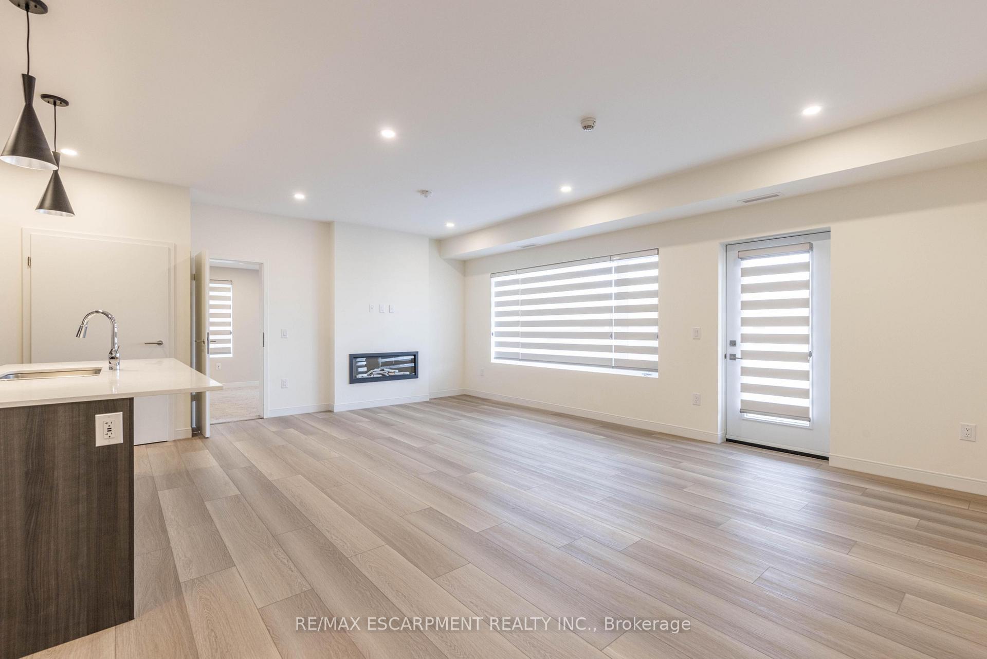 Photo 4 of Unit 107, 123 Lincoln Street, Welland, Broadway — HOMEH