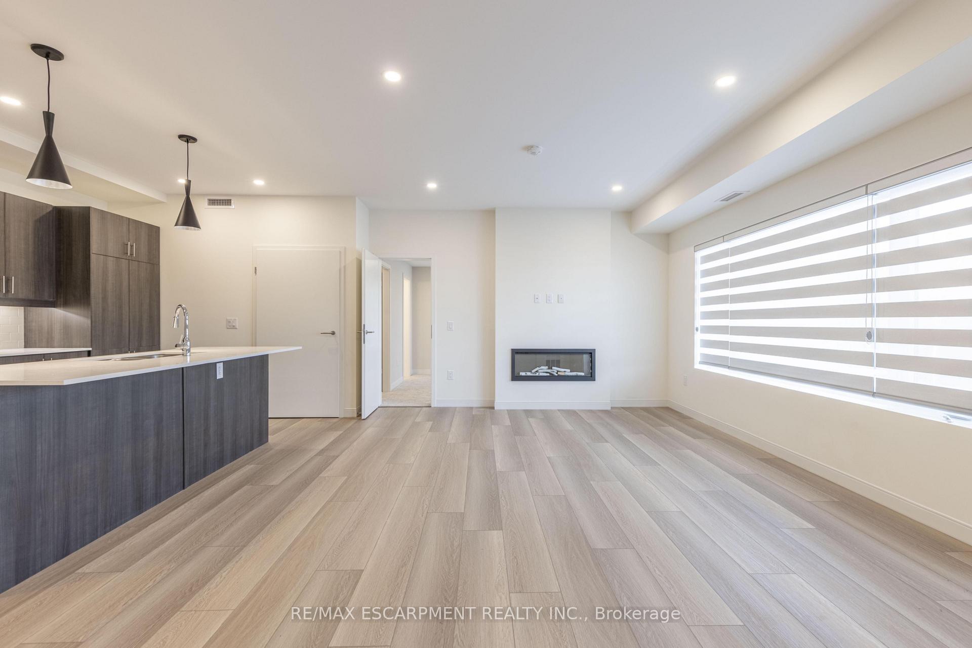 Photo 5 of Unit 107, 123 Lincoln Street, Welland, Broadway — HOMEH