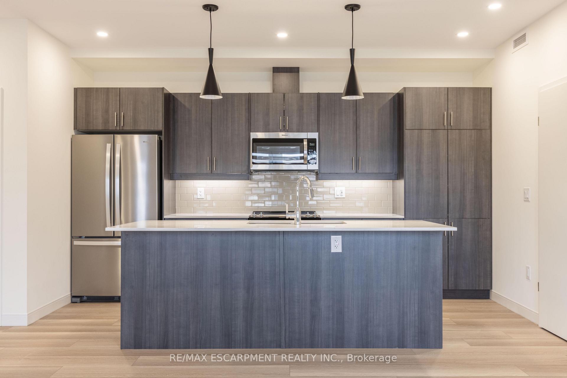 Photo 7 of Unit 107, 123 Lincoln Street, Welland, Broadway — HOMEH
