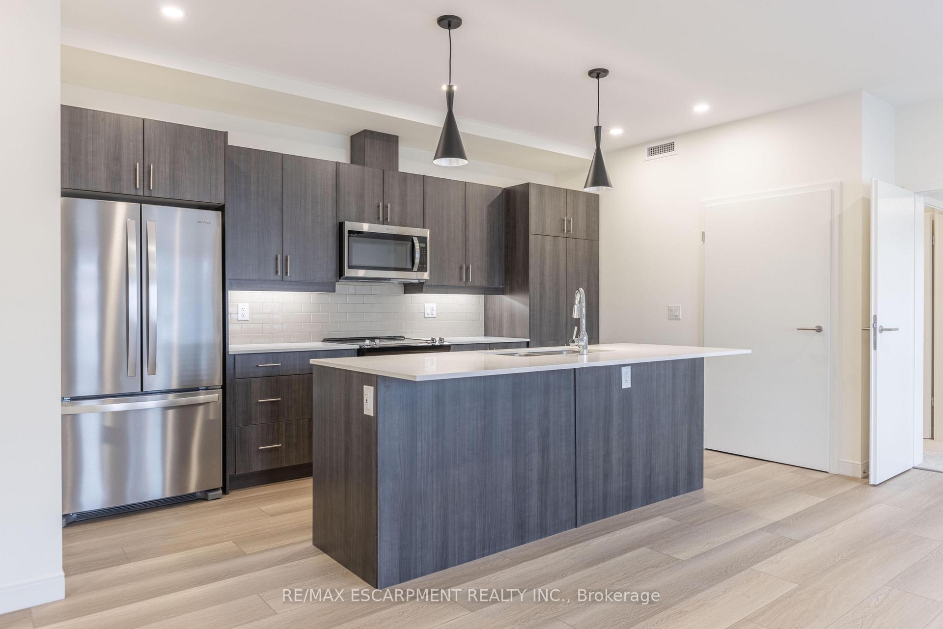 Photo 8 of Unit 107, 123 Lincoln Street, Welland, Broadway — HOMEH