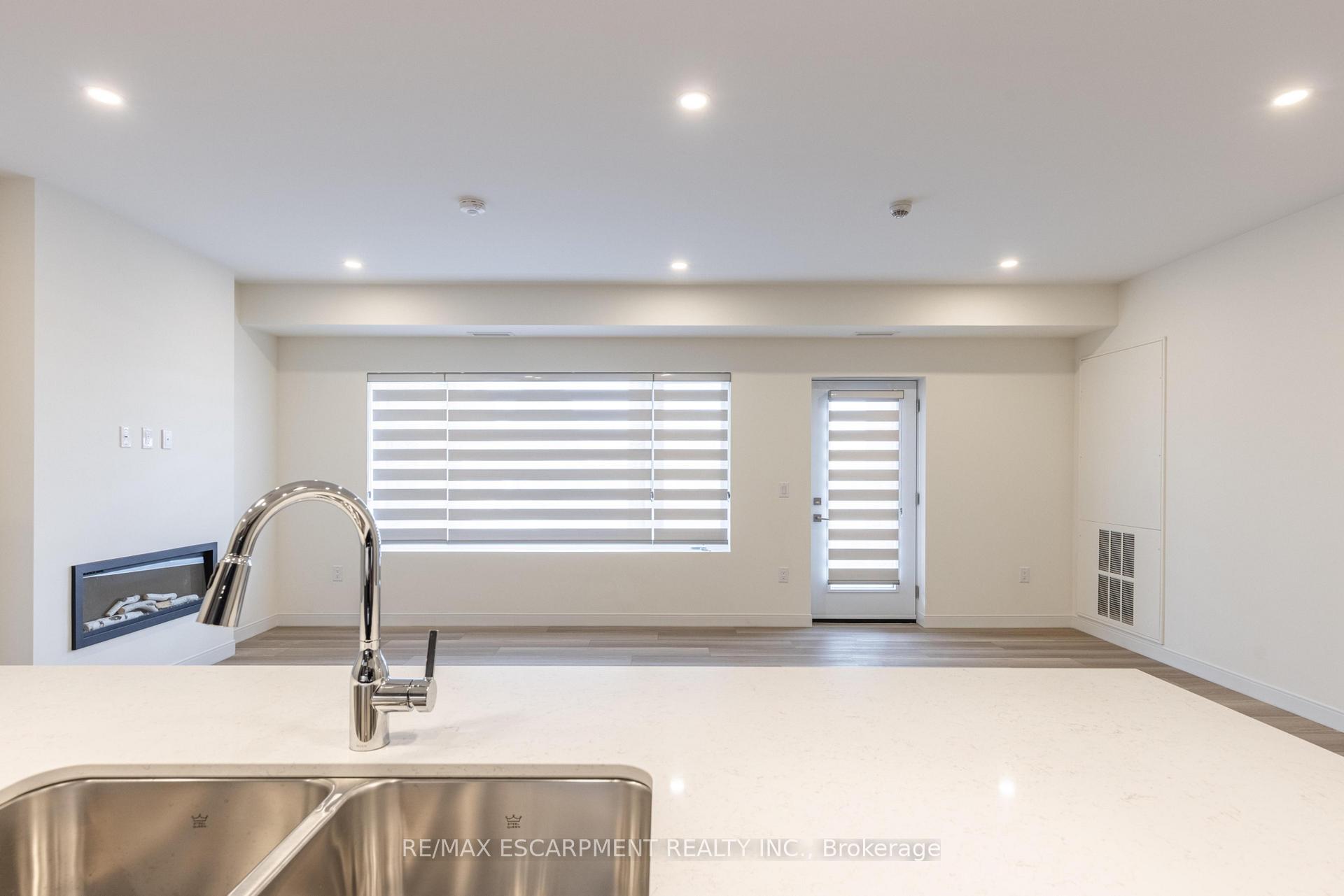 Photo 10 of Unit 107, 123 Lincoln Street, Welland, Broadway — HOMEH