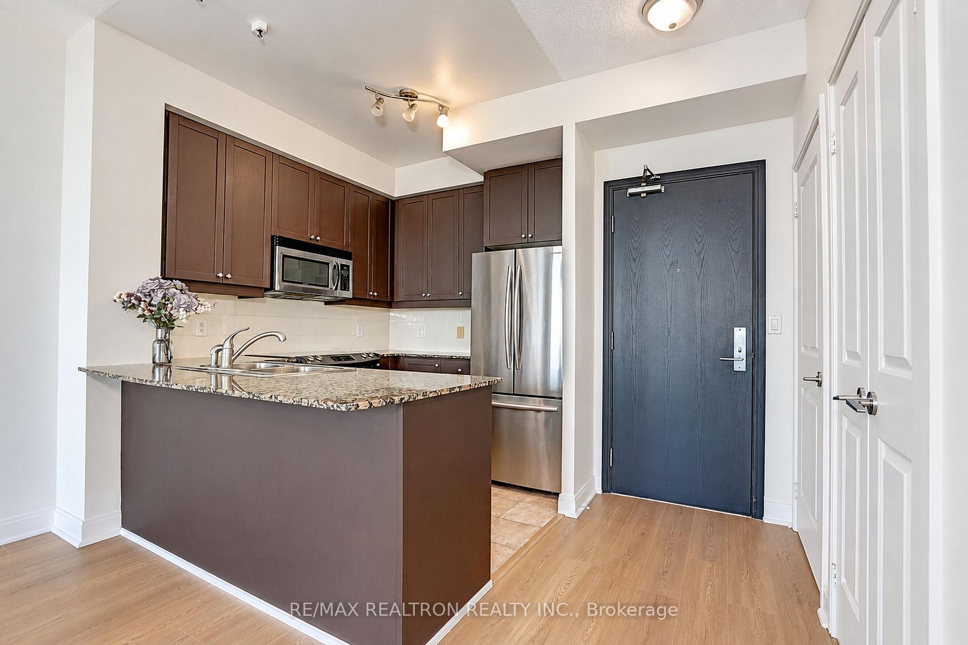 Photo 3 of Unit 710, 90 Absolute Avenue, Mississauga, City Centre — HOMEH