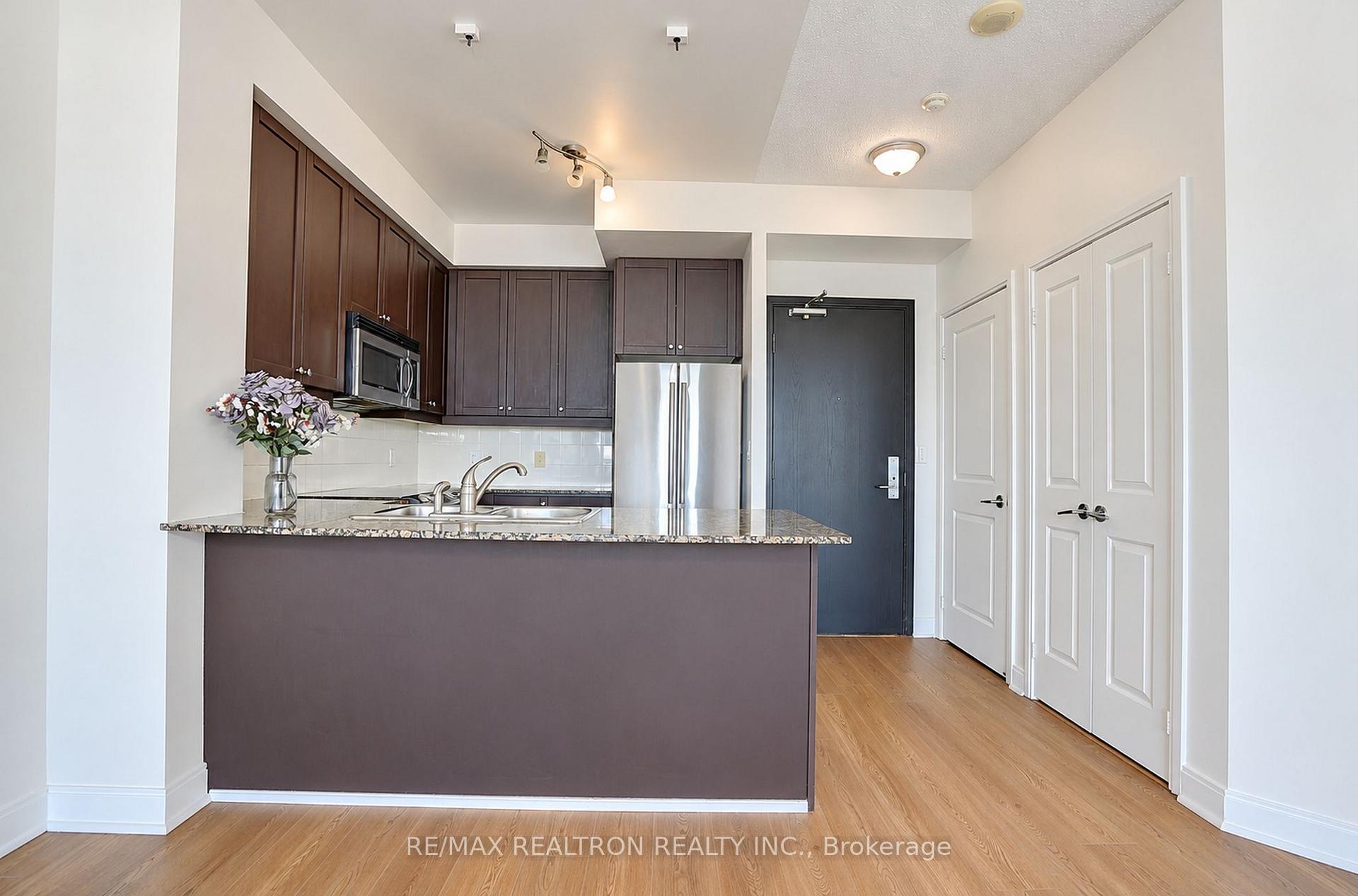Photo 4 of Unit 710, 90 Absolute Avenue, Mississauga, City Centre — HOMEH