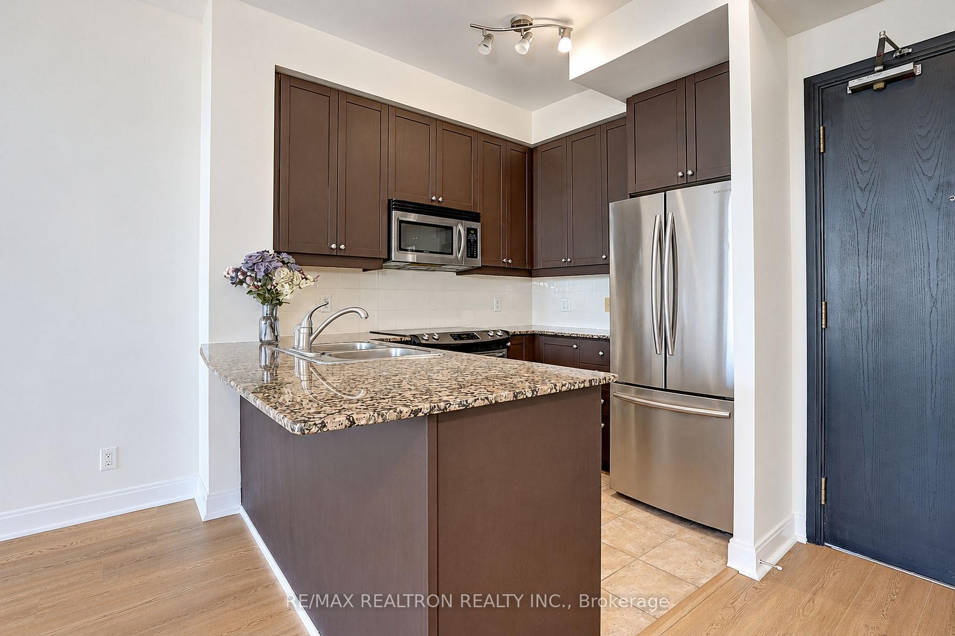 Photo 5 of Unit 710, 90 Absolute Avenue, Mississauga, City Centre — HOMEH