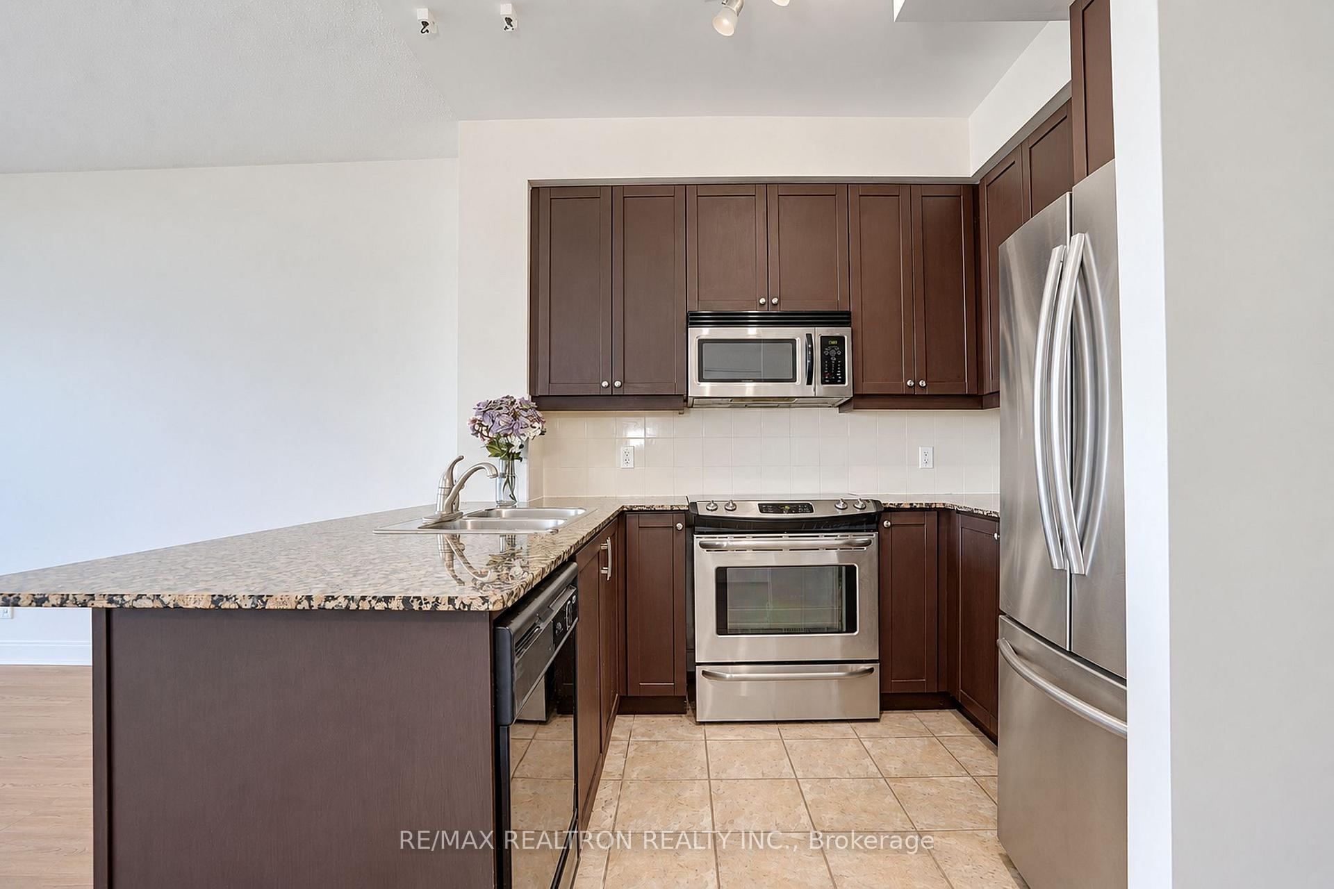 Photo 6 of Unit 710, 90 Absolute Avenue, Mississauga, City Centre — HOMEH