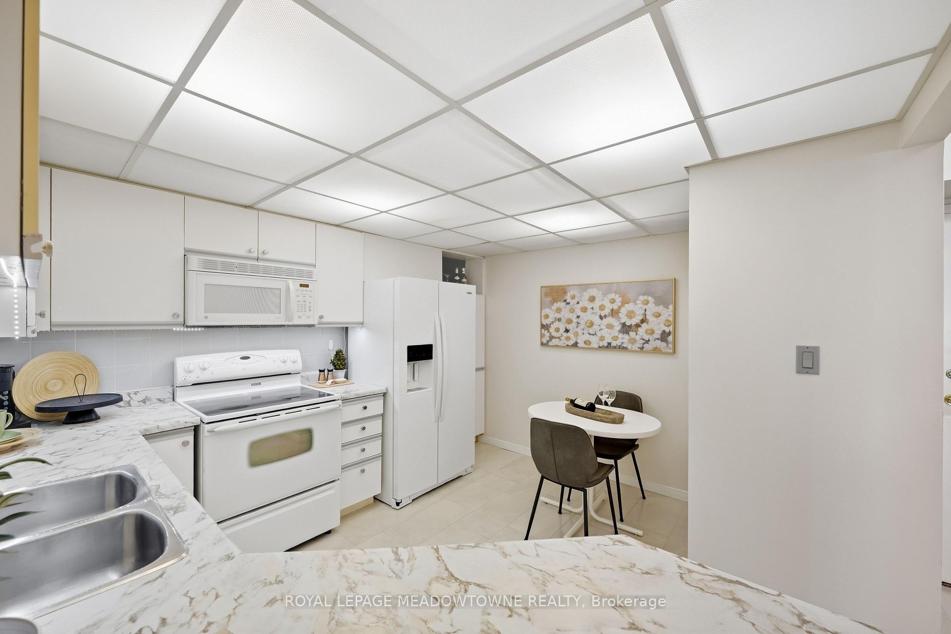 Photo 14 of Unit 702, 20 McFarlane Drive, Halton Hills, Georgetown — HOMEH