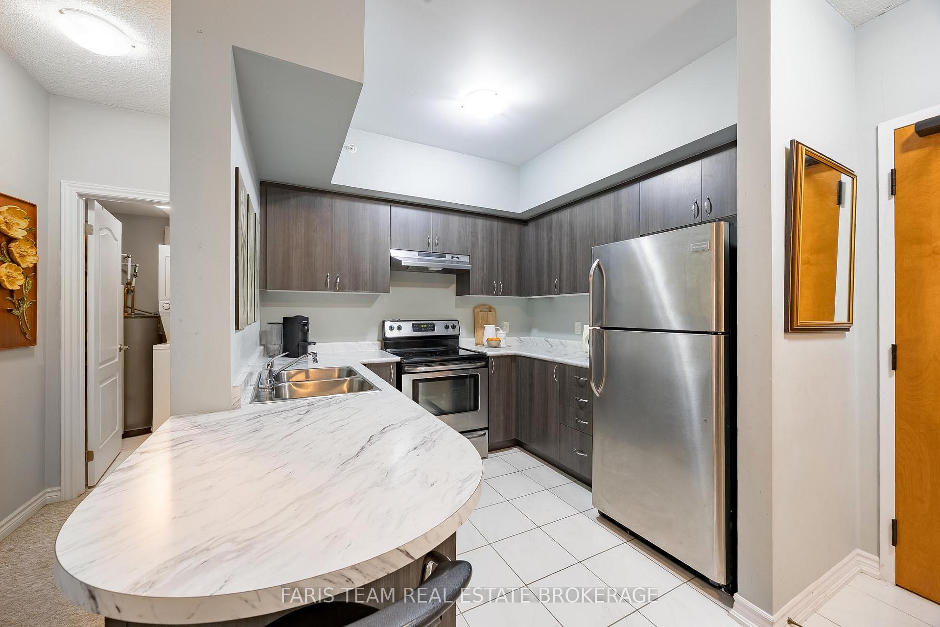 Photo 4 of Unit 207, 100 Dean Avenue, Barrie, Painswick South — HOMEH