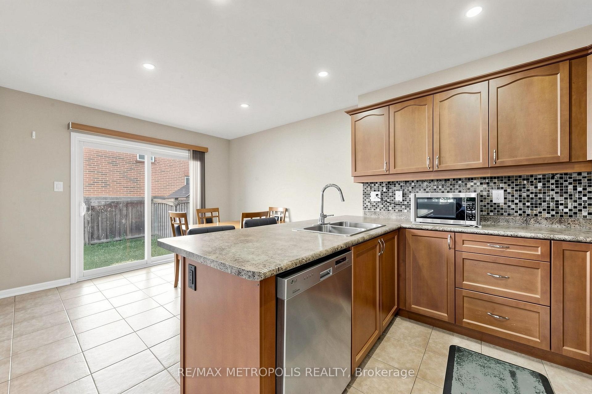 Photo 24 of 1913 Liatris Drive, Pickering, Duffin Heights — HOMEH