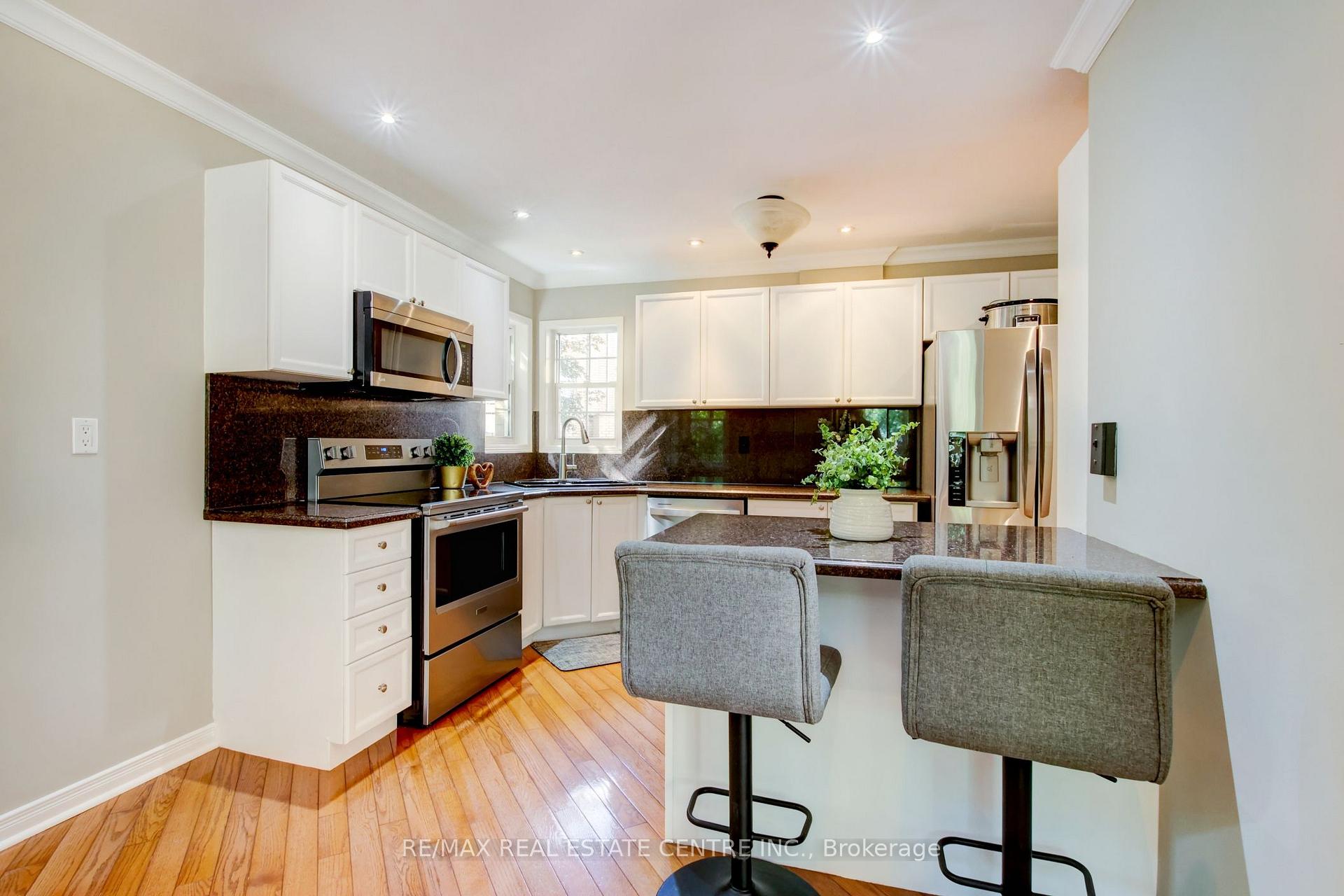 Photo 9 of Unit 19, 8305 Mclaughlin Road, Brampton, Brampton South — HOMEH