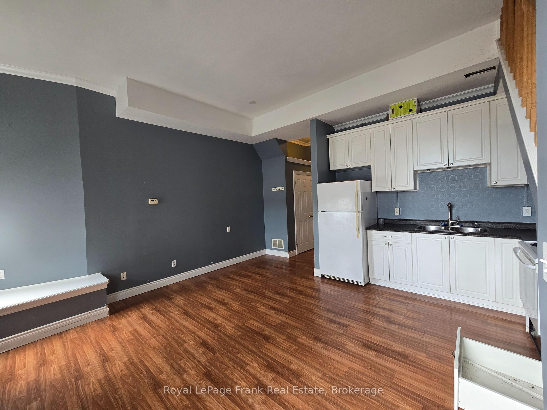 Photo 1 of Unit 207, 54 King Street E, Clarington, Bowmanville — HOMEH