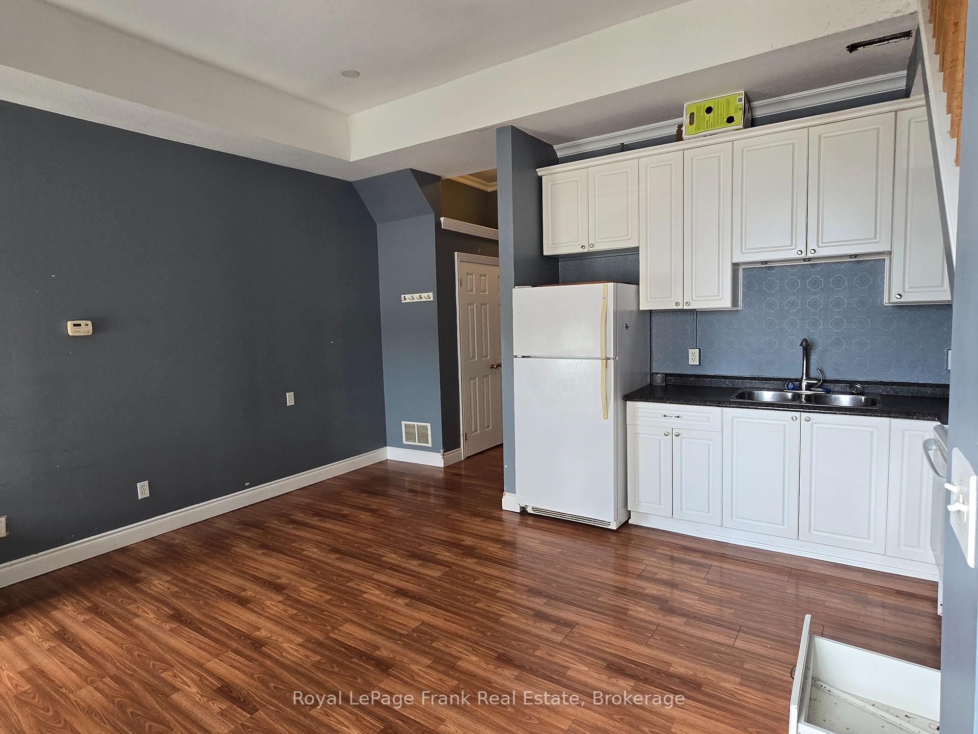 Photo 4 of Unit 207, 54 King Street E, Clarington, Bowmanville — HOMEH