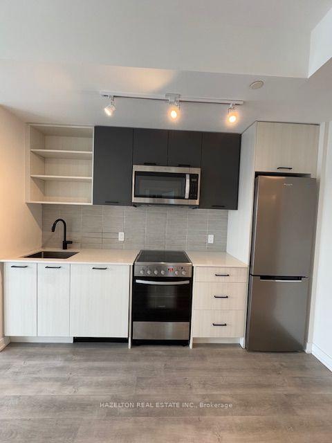 Photo 4 of Unit 705, 2300 St. Clair Avenue W, Toronto, Junction Area — HOMEH