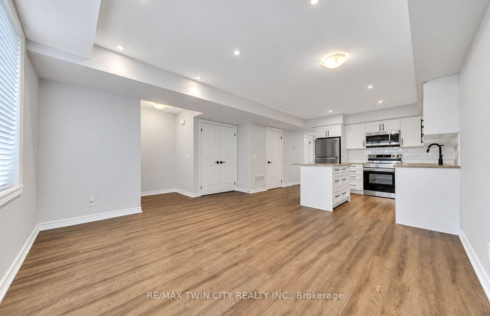 Photo 4 of Unit 11, 235 Chapel Hill Drive, Kitchener, Doon South — HOMEH