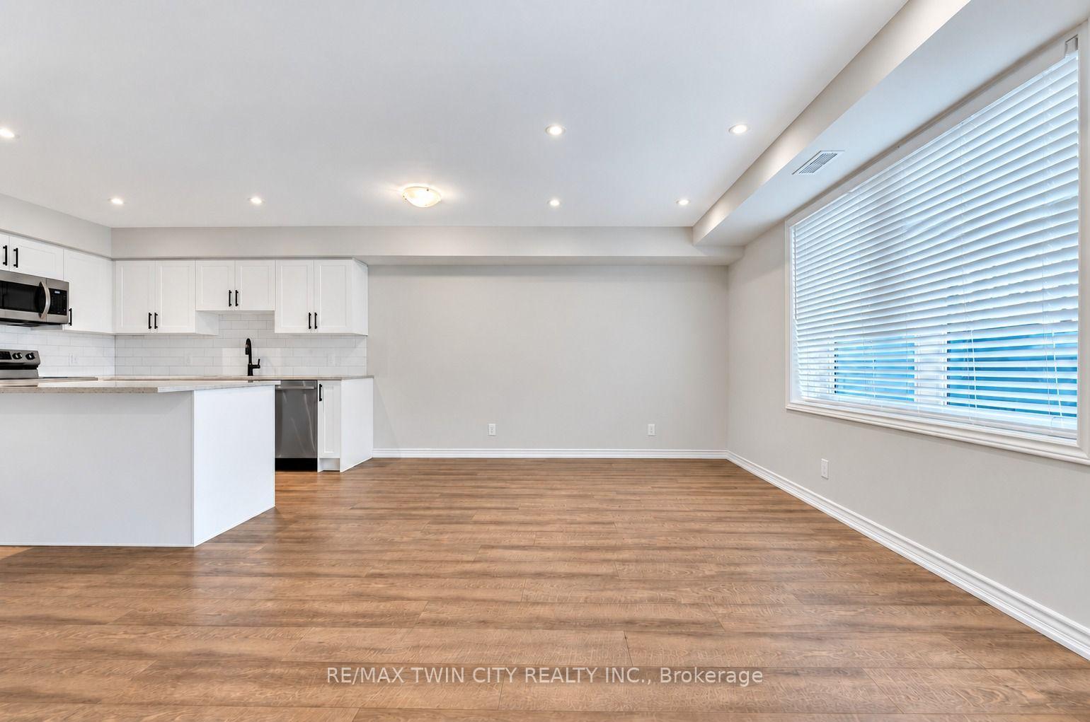 Photo 3 of Unit 11, 235 Chapel Hill Drive, Kitchener, Doon South — HOMEH