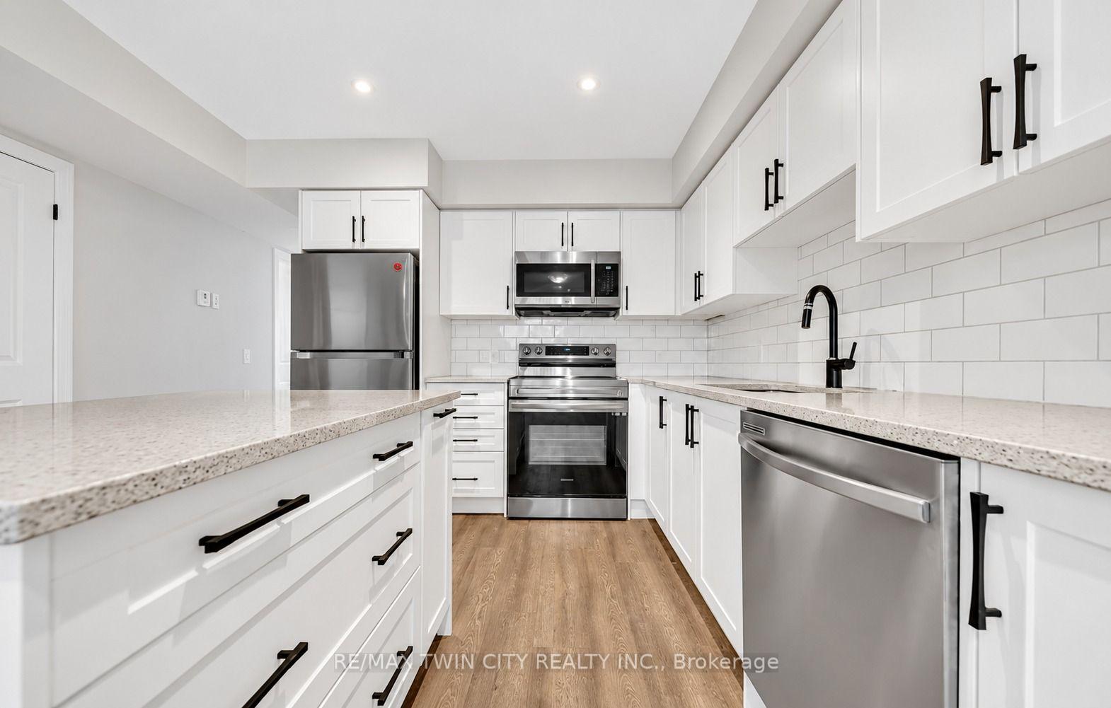 Photo 7 of Unit 11, 235 Chapel Hill Drive, Kitchener, Doon South — HOMEH