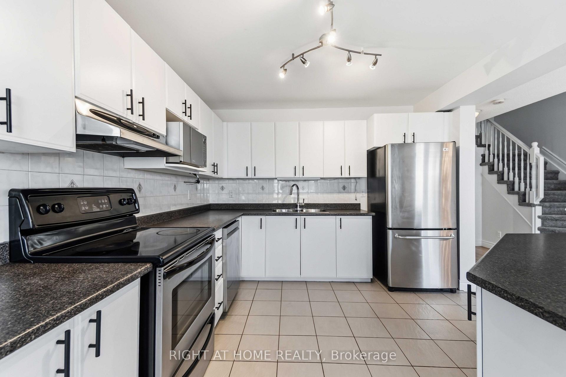 Photo 7 of 323 Berrigan Drive, Ottawa, Barrhaven - Longfields — HOMEH