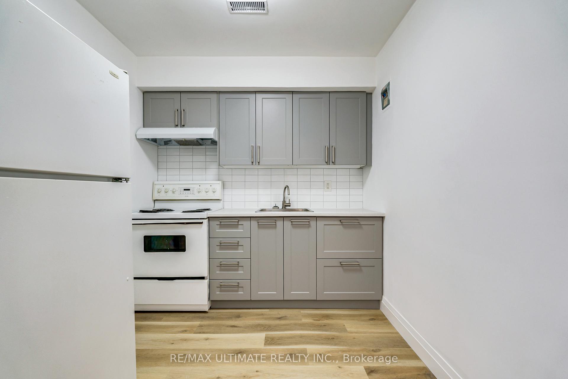 Photo 31 of 1945 Queen Street E, Toronto, The Beaches — HOMEH