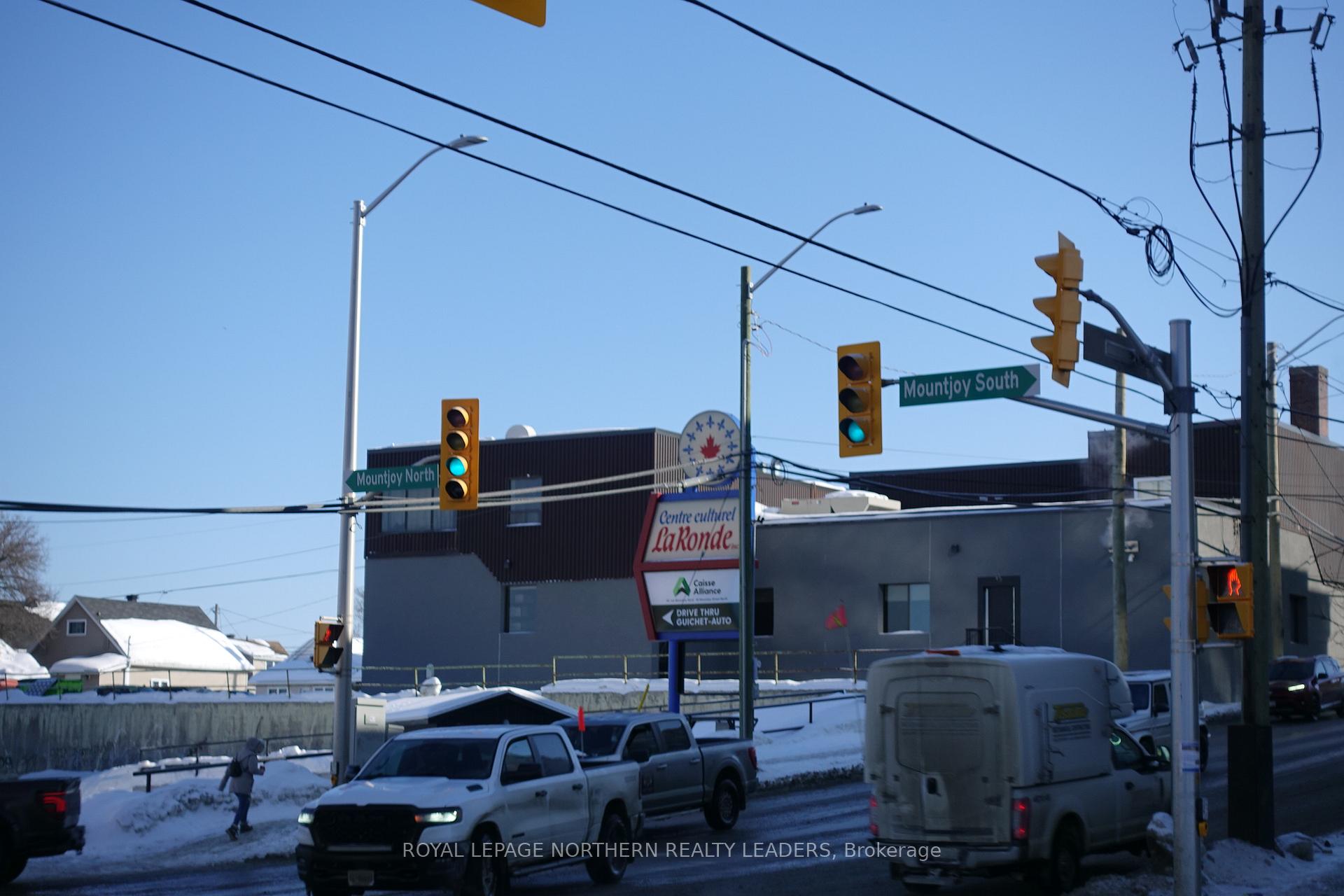 Photo 2 of 11 Elm Street N, Timmins, TNE - Central — HOMEH